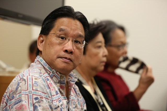 Attorney General of Hawaii David Louie sits with his team at the Hawaii State Ethics Commission conference room. 19 nov 2014. photo Cory Lum.