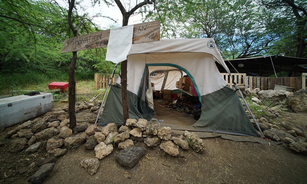 A tent near the entrance has been set up to accept donations. People come by at all hours to look for what they need.