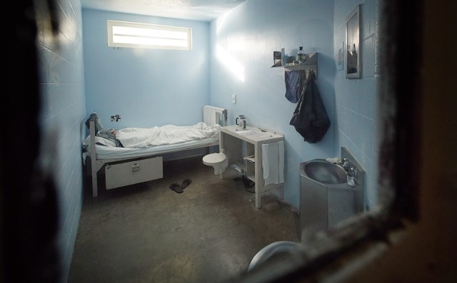 WCC Windward Correctional/Prison during tour. Segregated inmate sleeps in her cell at Windward Correctional Center. 17 dec 2015. photograph Cory Lum/Civil Beat