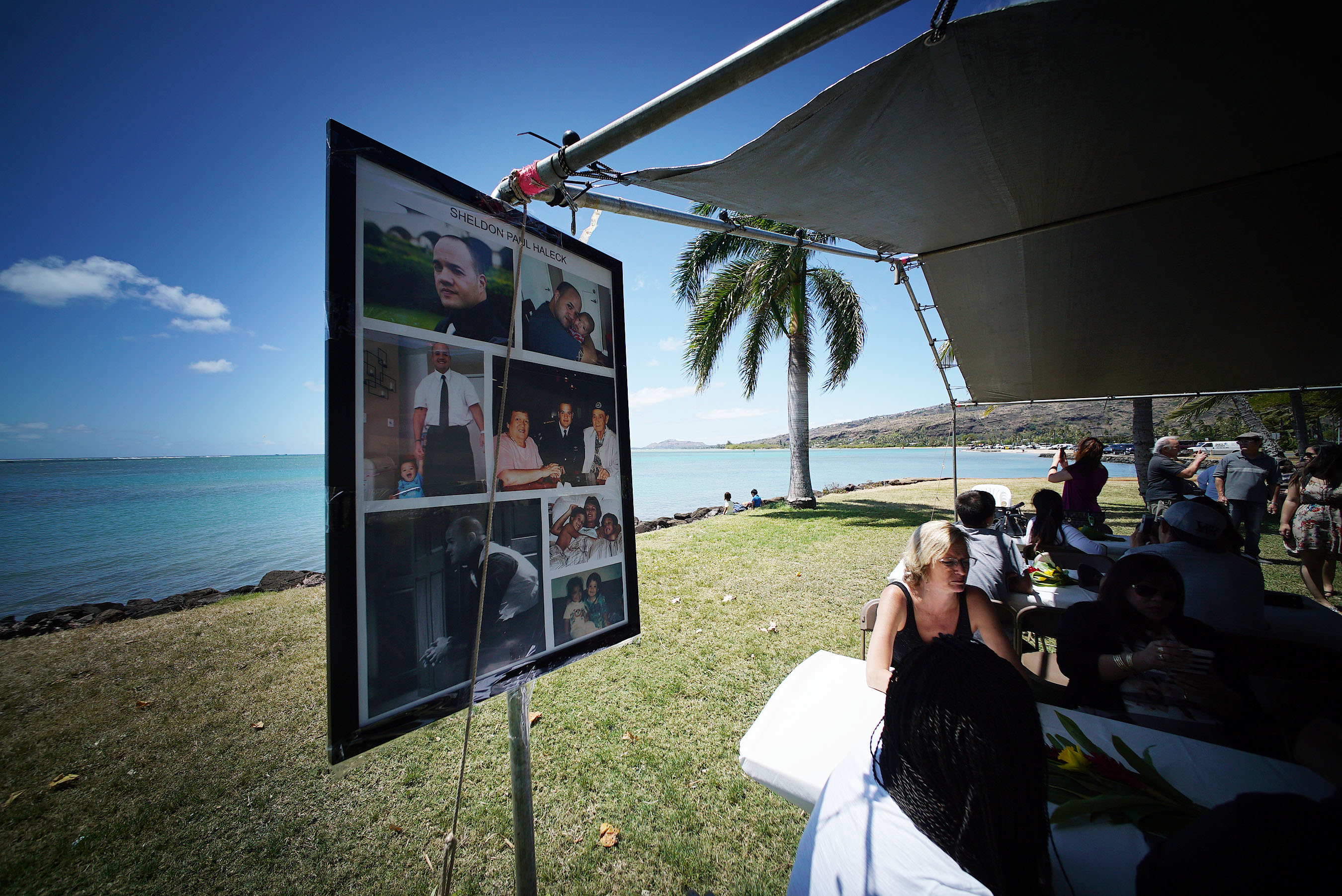 Friends and family gather for Sheldon Paul Haleck's  memorial 1 year service at Maunalua Bay. 19 march 2016.
