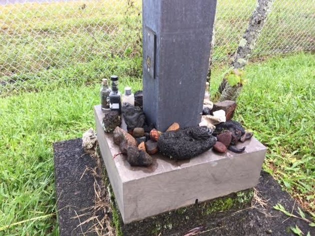 A collection of lava rocks returned to the U.S. Postal Service sits in the parking lot of the Post Office in Hilo