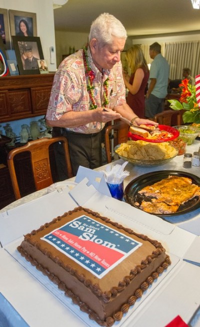 State Sen. Sam Slom gathers with supporters while awaiting election returns. The only Republican state senator was trailing in early returns.