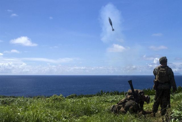 Marines fire an 81 mm mortar while training on Farallon de Medinilla on September 16.