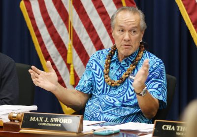 HPD Police Commission Chair Max Sword gestures during meeting held at HPD headquarters.