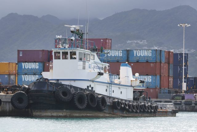 Young Brothers Tugboat Mikiona sits dockside in Honolulu Harbor.