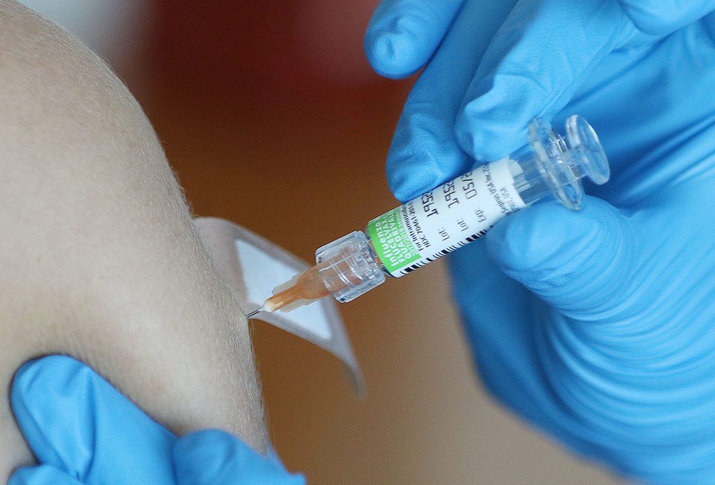 Vaccination Flu shot 2017 syringe.