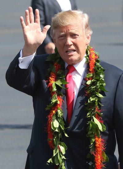 President Donald J Trump waves to media after arrival to Joint Base Hickam Pearl Harbor.
