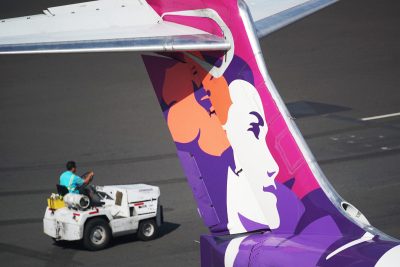 Hawaiian Airlines at Daniel Inouye Airport Aloha tail.