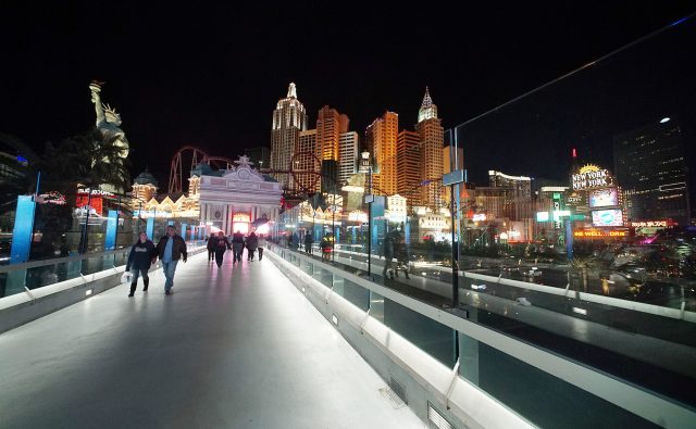 Las Vegas New York New York reflections along the Las Vegas Boulevard pedestrian overpass.