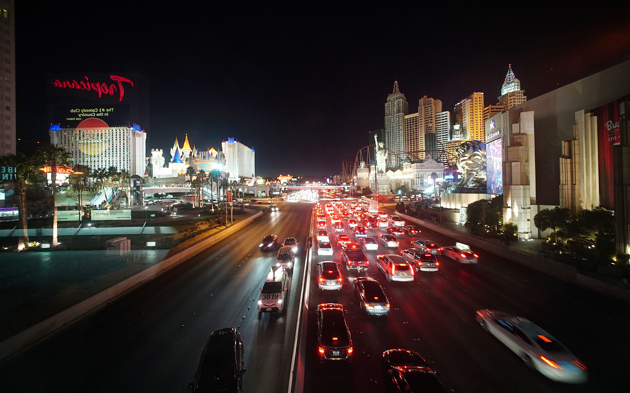 Tropicana Overpass Las Vegas at night with New New York Hotel/Las Vegas Boulevard.