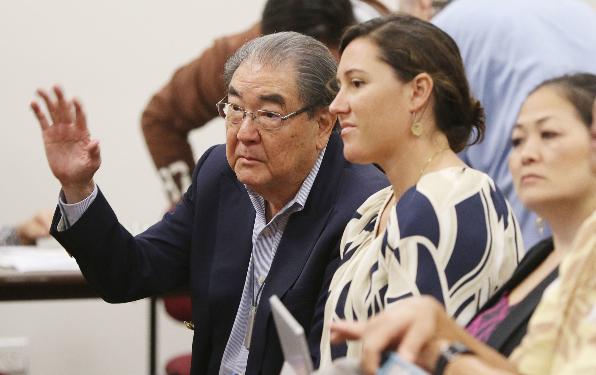 Bob Toyofuku a lobbyist sits in a human services hearing at the Capitol. Legislature