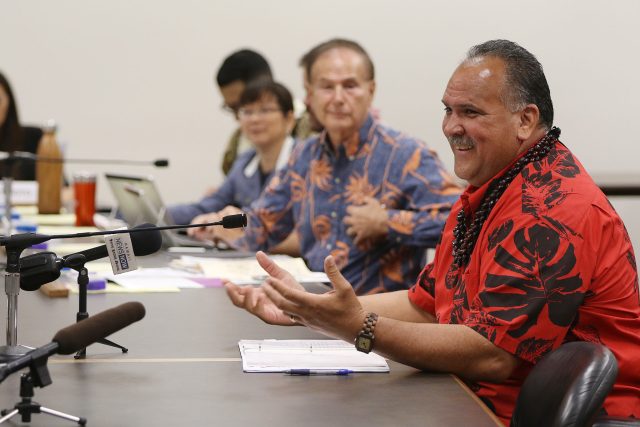 Kauai Mayor Bernard Carvalho Jr.speaks to lawmaker at the capitol.