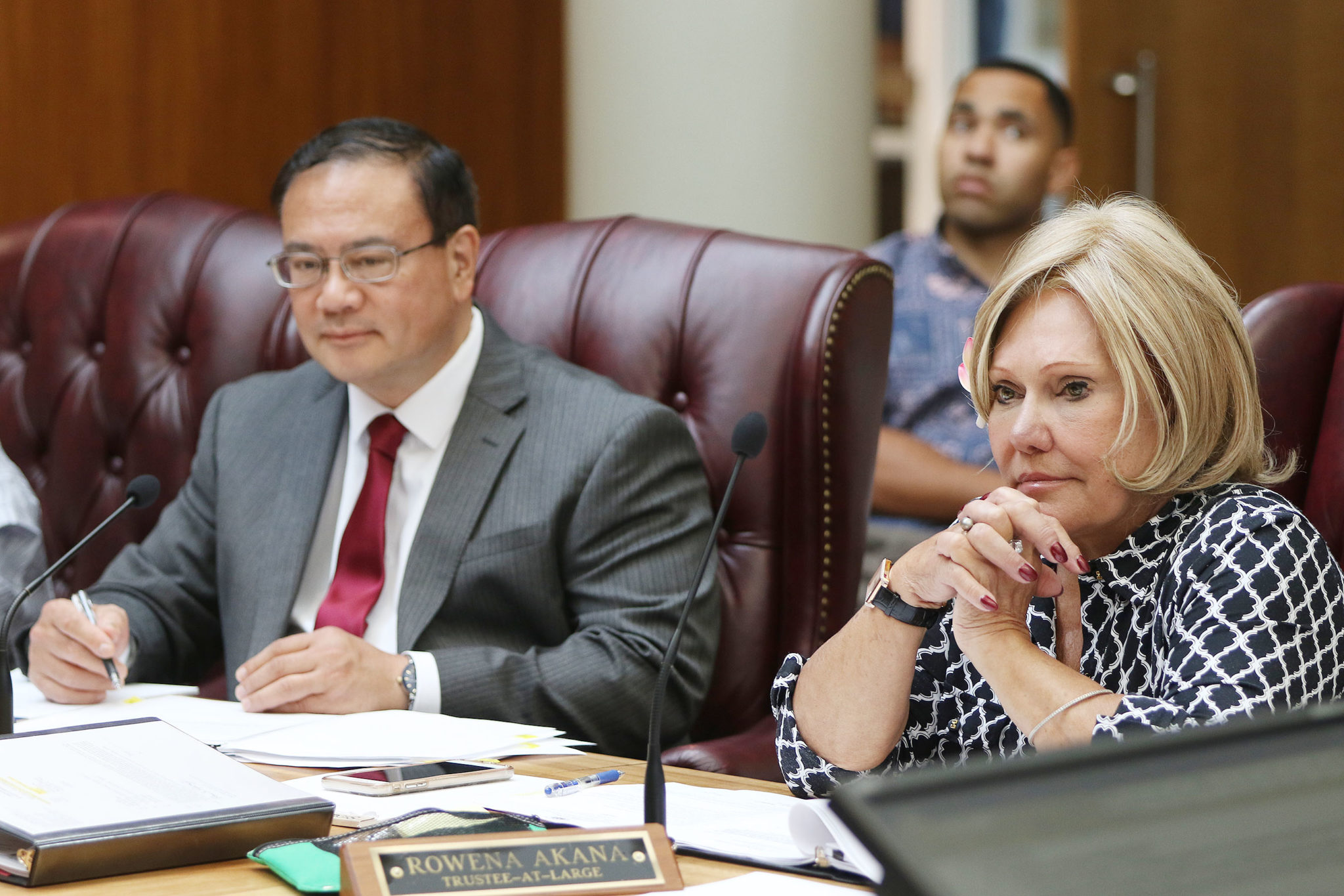 OHA Trustee Rowena Akana and Kelii Akina during recent board meeting.