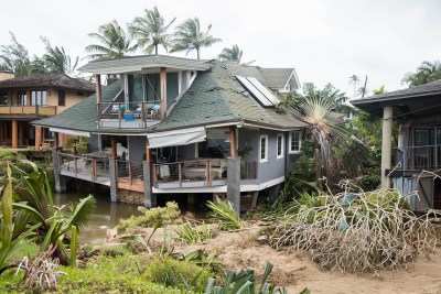 Kauai: Record Storm Drives Tourists Out But Hanalei Residents Dig In