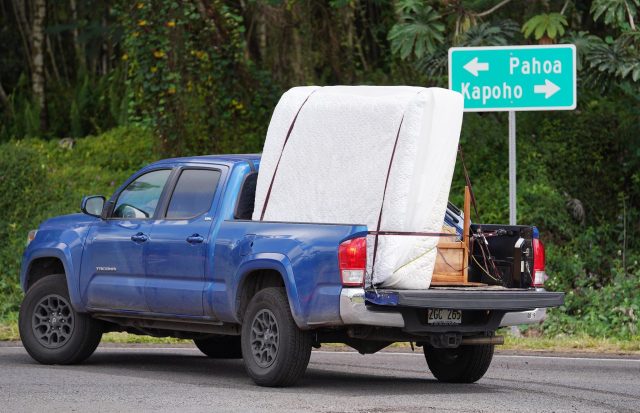 Leilani Estates residents evacuate their belongings as lava inundates their community.