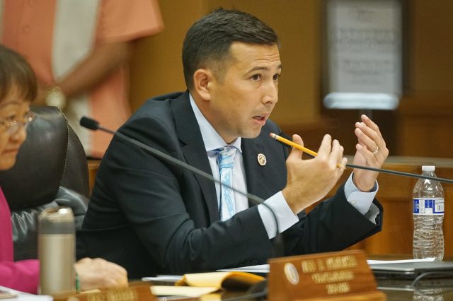 Budget Chair Council member Trevor Ozawa makes point Bill 35 about putting a cap on ride share services in Honolulu.