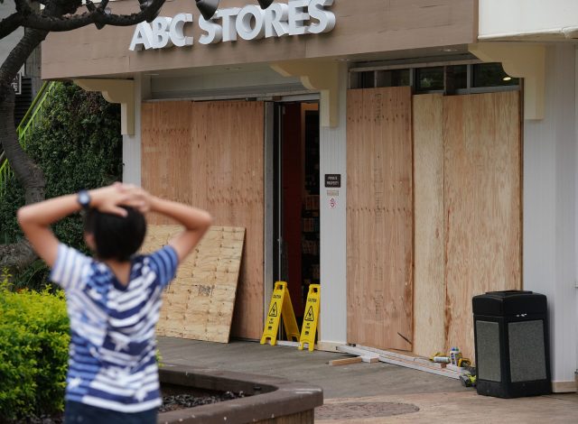 ABC Stores Kalakaua Ave shop boarded in preparation for the arrival of Hurricane Lane.