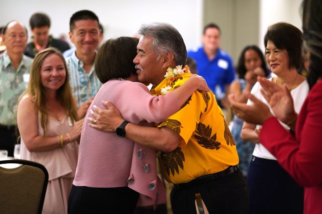 Congresswoman Gubernatorial Candidate Colleen Hanabusa hugs Governor David Ige after her speech at the Democrats Unity Breakfast held at the Dole Cannery Ballroom. 12 aug 2018