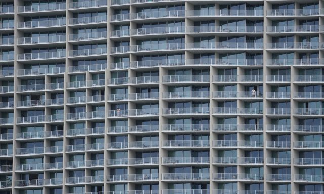 Lone person on lanai at the Ritz Carlton Residences in Waikiki