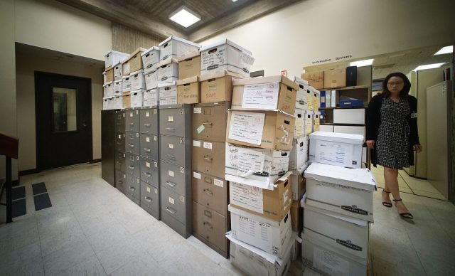 Mountains of boxes with records at Oahu Community Corrections Center OCCC.