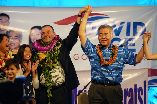 Governor David Ige and LG elect Josh Green take the stage after the first print out at Dole Cannery ballrroom.