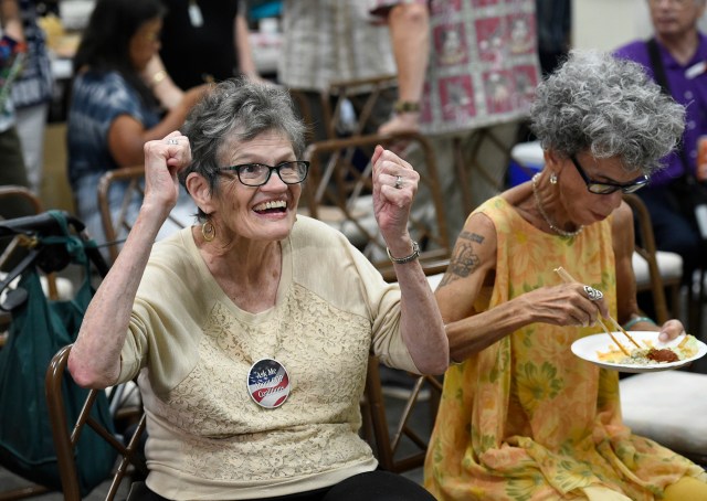 Republican supporter Beverly C Sutton Toomey (left) reacts to the news of the Republicans keeping their hold on the senate at the Honolulu Republican Party Headquarters on Tuesday, Nov. 6, 2018. (Photo by Ronen Zilberman