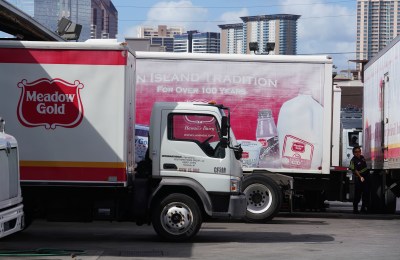 Meadow Gold milk deliver trucks parked.