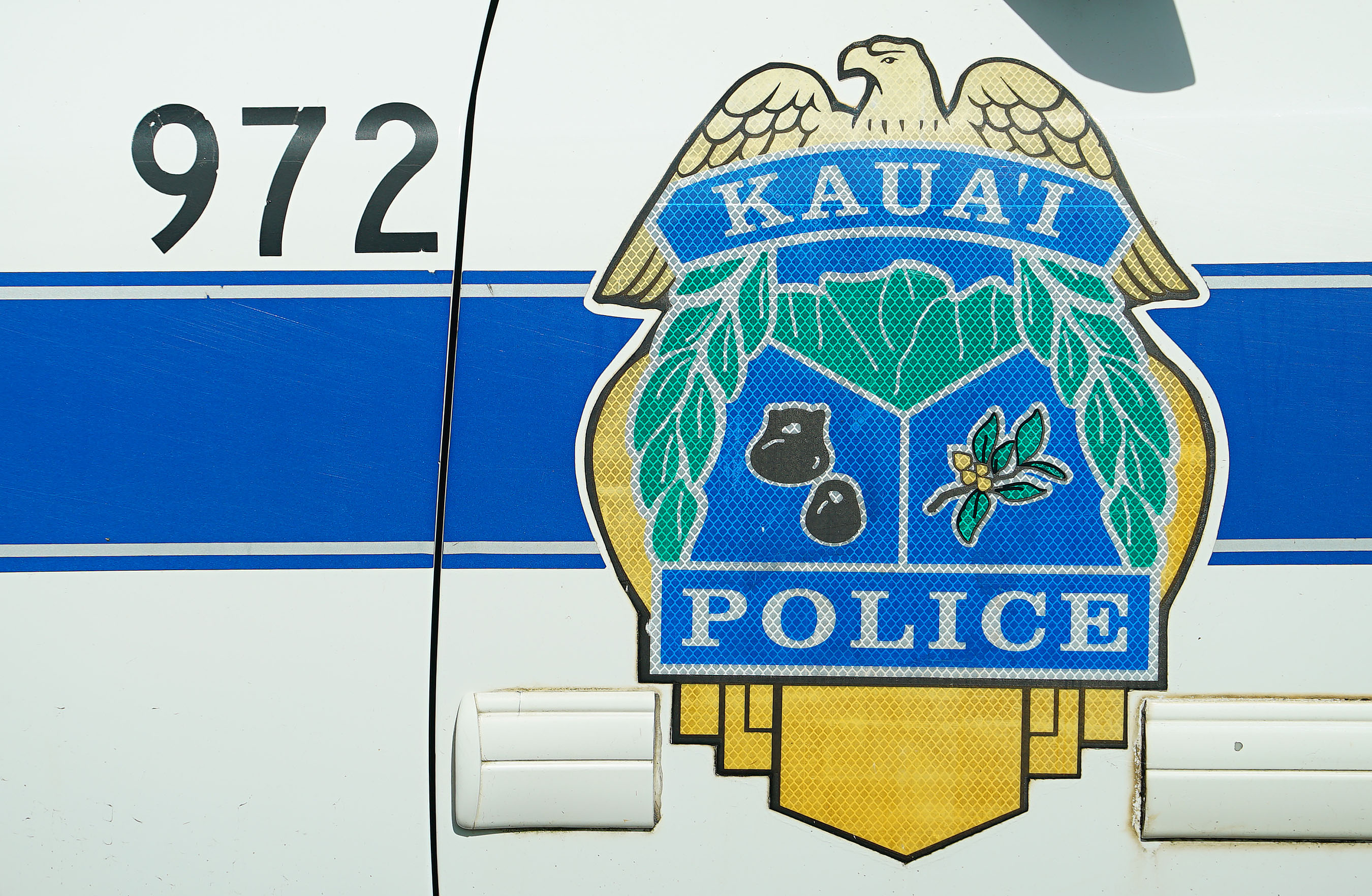 Kauai Police Dept signage on police vehicle.