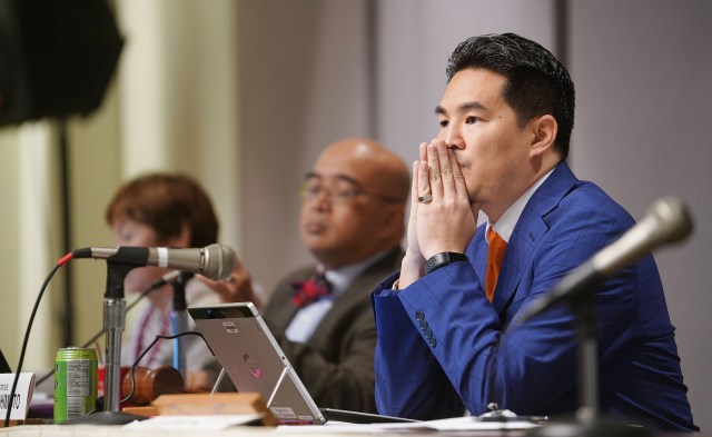 Grants in Aid Rep Scott Nishimoto listens to requests during hearing.