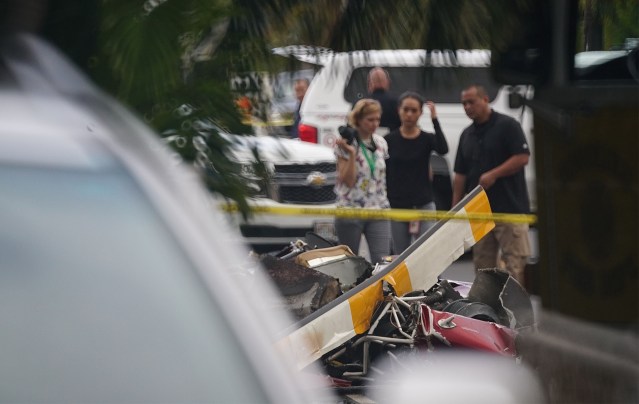 Helicopter debris along Oneawa Street in Kailua after helicopter crashed in a residential neighborhood.