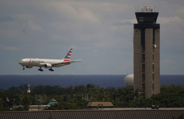 American Airlines lands at Daniel Inouye Airport.