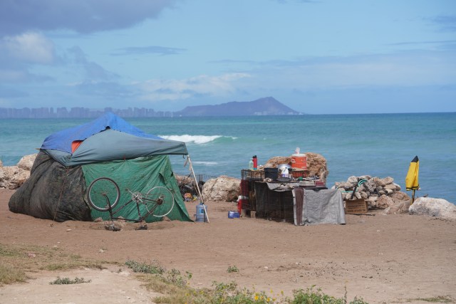 Tents on the west side of Hau Bush / Oneula Beach Park in Ewa.