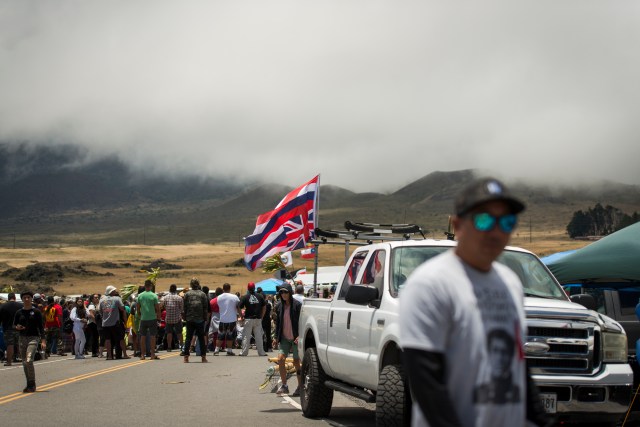 KIa'i gather for olelos (speeches) at Mauna Kea Access Road on July 26, 2019.
