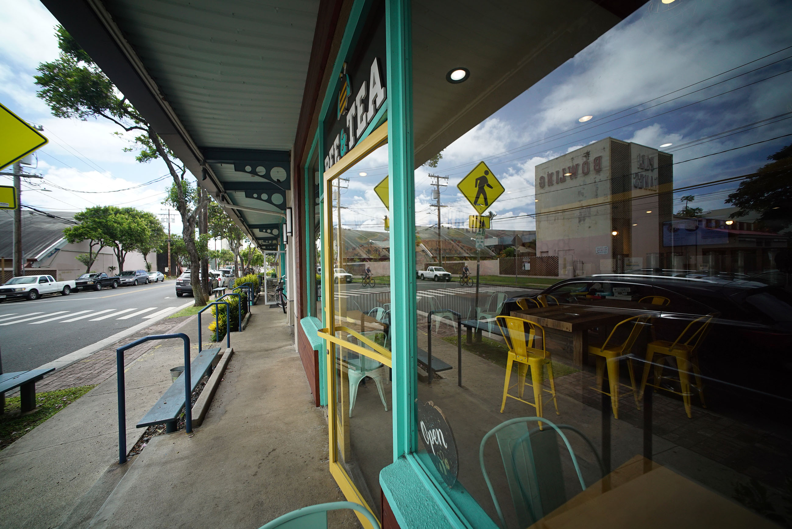 Pali Lanes in Kailua Bowling Alley reflection in galleries and shops across the street in Kailua.
