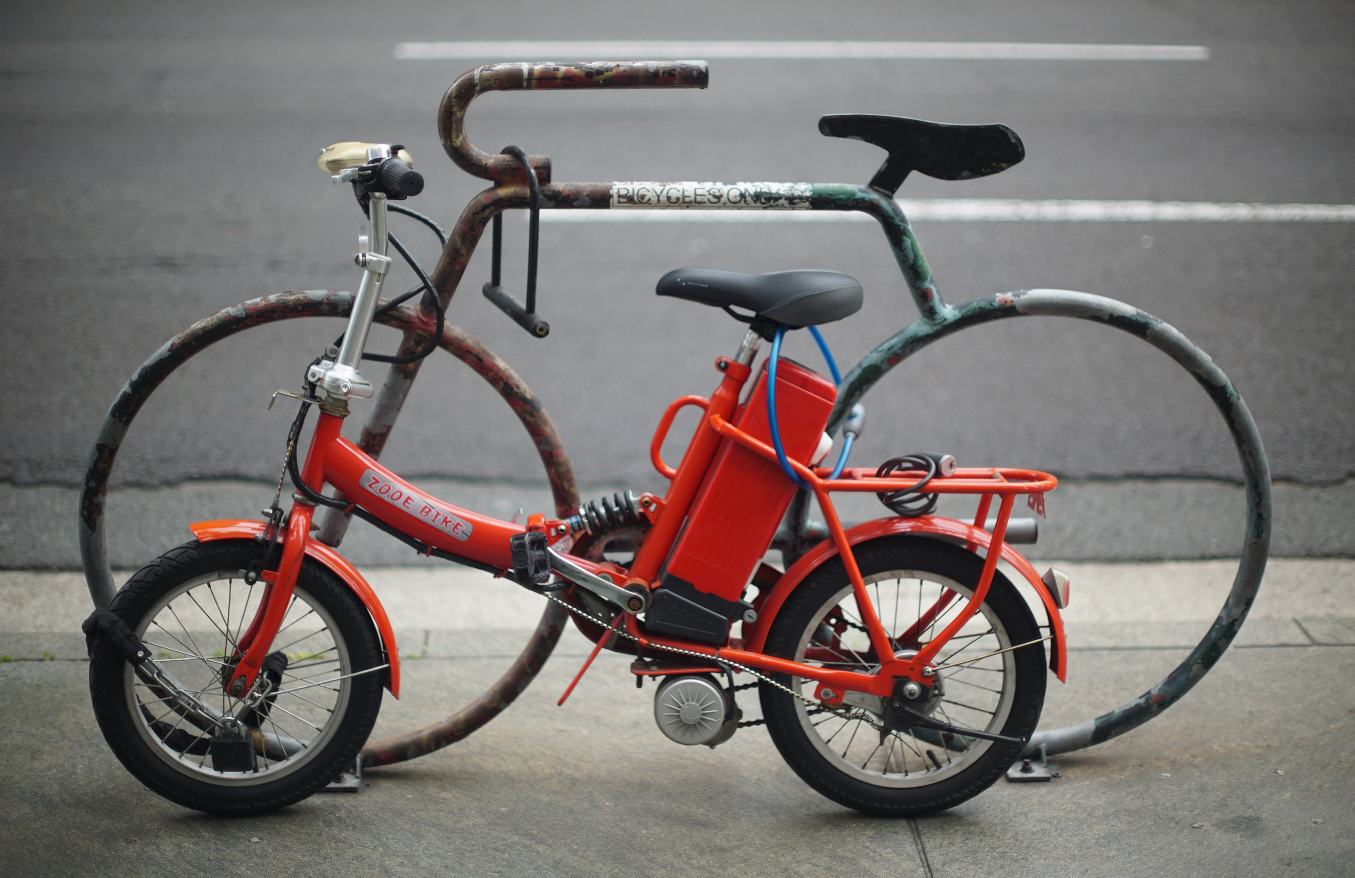 Electric Bicycle parked along Bishop Street in downtown Honolulu.