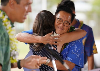 Keith Amemiya hugs his wife Bonny Amemiya before announcing his candidacy for Mayor of Honolulu at Ala Wai Park.