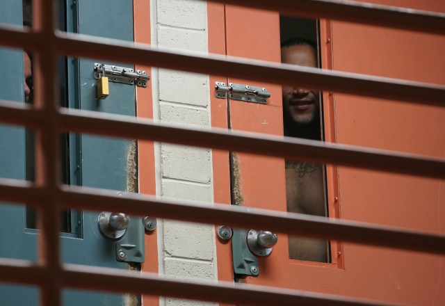 Maui Community Correctional Center inmates pound and yell during tour in module B