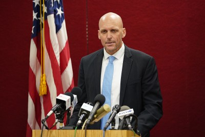 NCIS Special Agent Norman Dominesey speaks during Pearl Harbor shooting press conference.