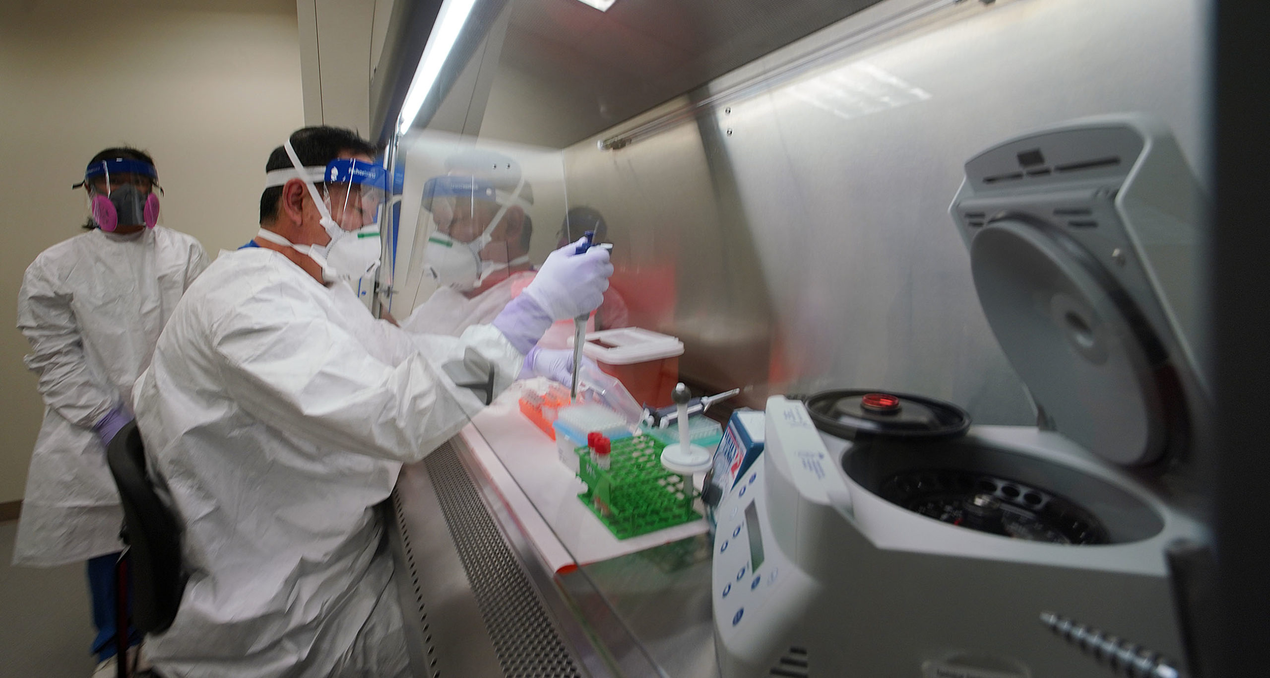 State Microbiologist Mark Nagata gives a demonstration of extracting Nucleic acid at the Department of Health, Public Health and Environmental Laboratories located at Waimano Home Road.