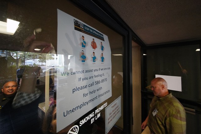 Princess Ruth Keelikolani building. Staff put up a sign that they can’t help sick people at the Unemployment office.