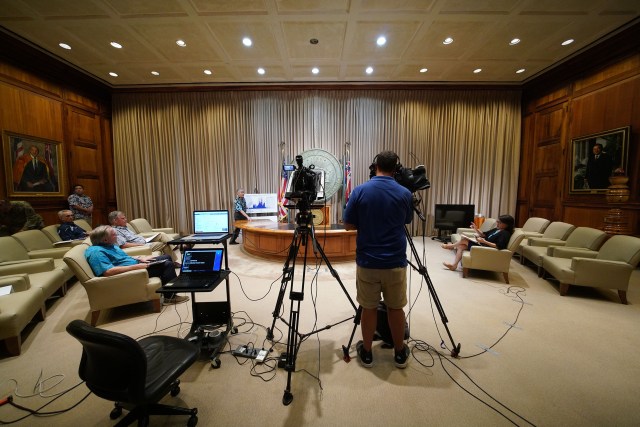 Governor David Ige walks up to podium at the Capitol during an update on 3 dead from Coronavirus COVID19. April 3, 2020.