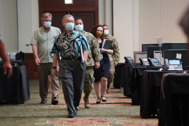 Department of Health Director Dr. Bruce Anderson, General Hara and Governor Ige walk into press conference before press conference on contact tracing and the newly opened spaces allowing for the ability to contact trace. August 19, 2020