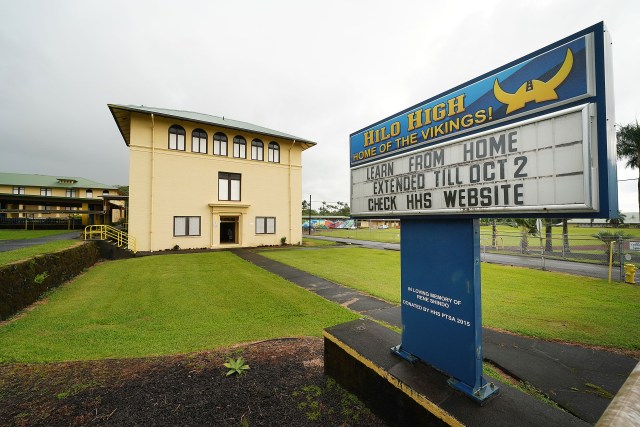 Hilo High School sign reads ‘Learn from home extended October 2’ during COVID-19 surge in cases. September 24, 2020