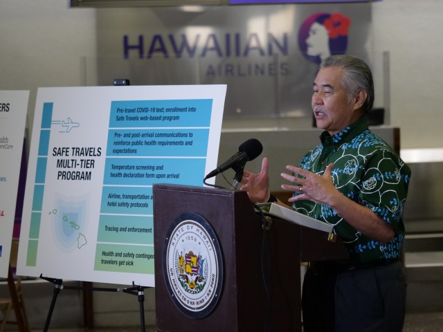 Hawaii Govenor David Ige gestures as he gives a media briefing Tuesday, Oct. 7, 2020 in Honolulu, HI. The briefing was held to unveil new COVID-19 safety measures the state plans to implement upon re-opening to travelers on October 15th. (Ronen Zilberman photo Civil Beat)