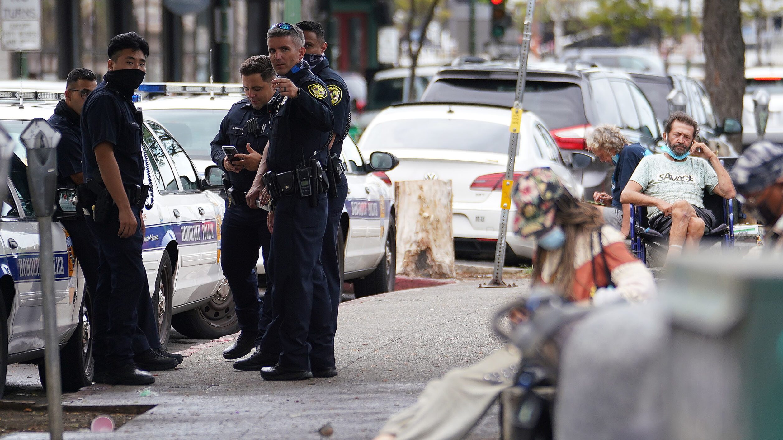 HPD Police officers gather along River Street to cite homeless inviduals during COVID-19 pandemic. October 23, 2020