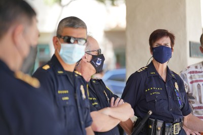 HPD Honolulu Police Chief Susan Ballard stands with colleagues before press conference at the Waikiki substation during COVID-19 pandemic.