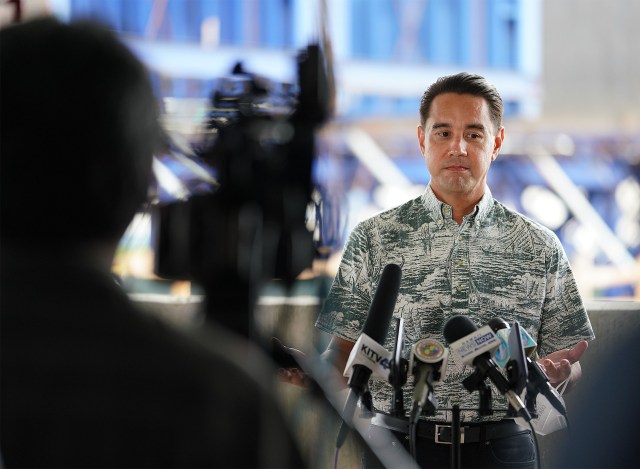 Honolulu City council member Joey Manahan speaks during Mayor Caldwell’s press conference on a rail plan held at the Daniel K. Inouye International Airport parking garage.