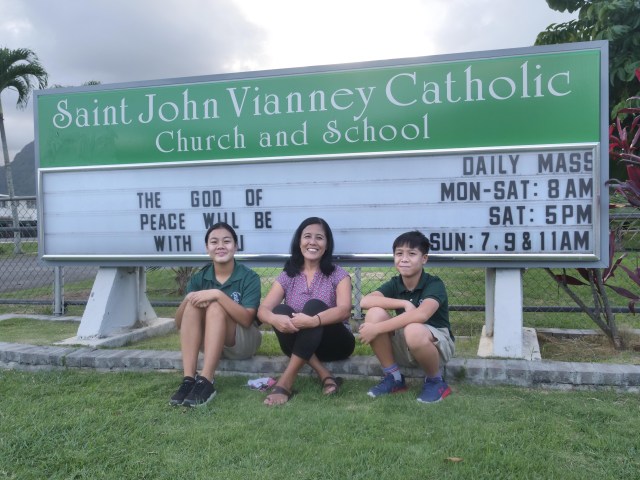 Dr. Mary Valenzuela sits with her daughter Erin (left) a 7th grader and son Kainoa (right) a 5th grader both at the St. John Vianney School on Wednesday, October 7, 2020. (Ronen Zilberman photo Civil Beat)
