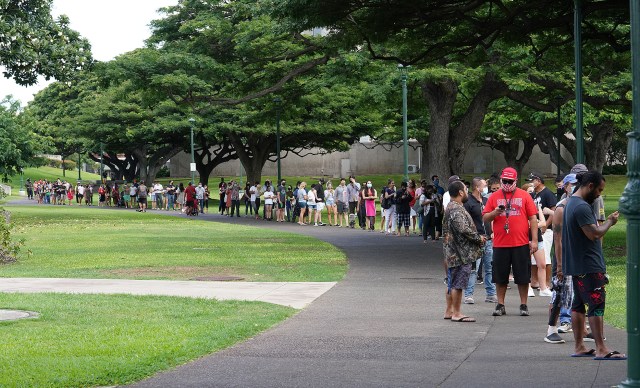 Scores of voters wait in a socially distanced line from the Frank Fasi Building to Honolulu Hale for the 2020 General Election.