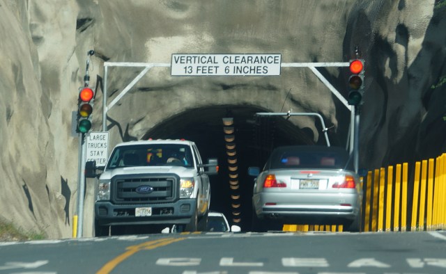 Diamond Head hike visitors have to pass thru the tunnels with new traffic lights allowing one way to vehicles on each light cycle during COVID-19.